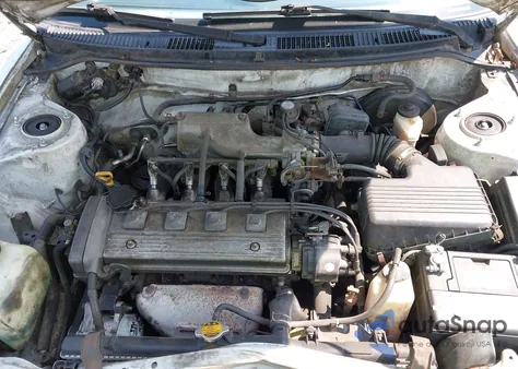 1996 Toyota Corolla Dx z USA, uszkodzony, nr VIN 2T1BB02E6TC159935